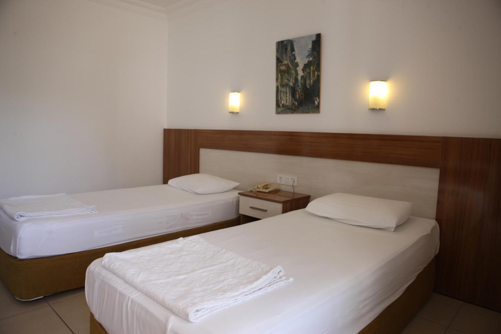 Doppel- oder Zweibettzimmer