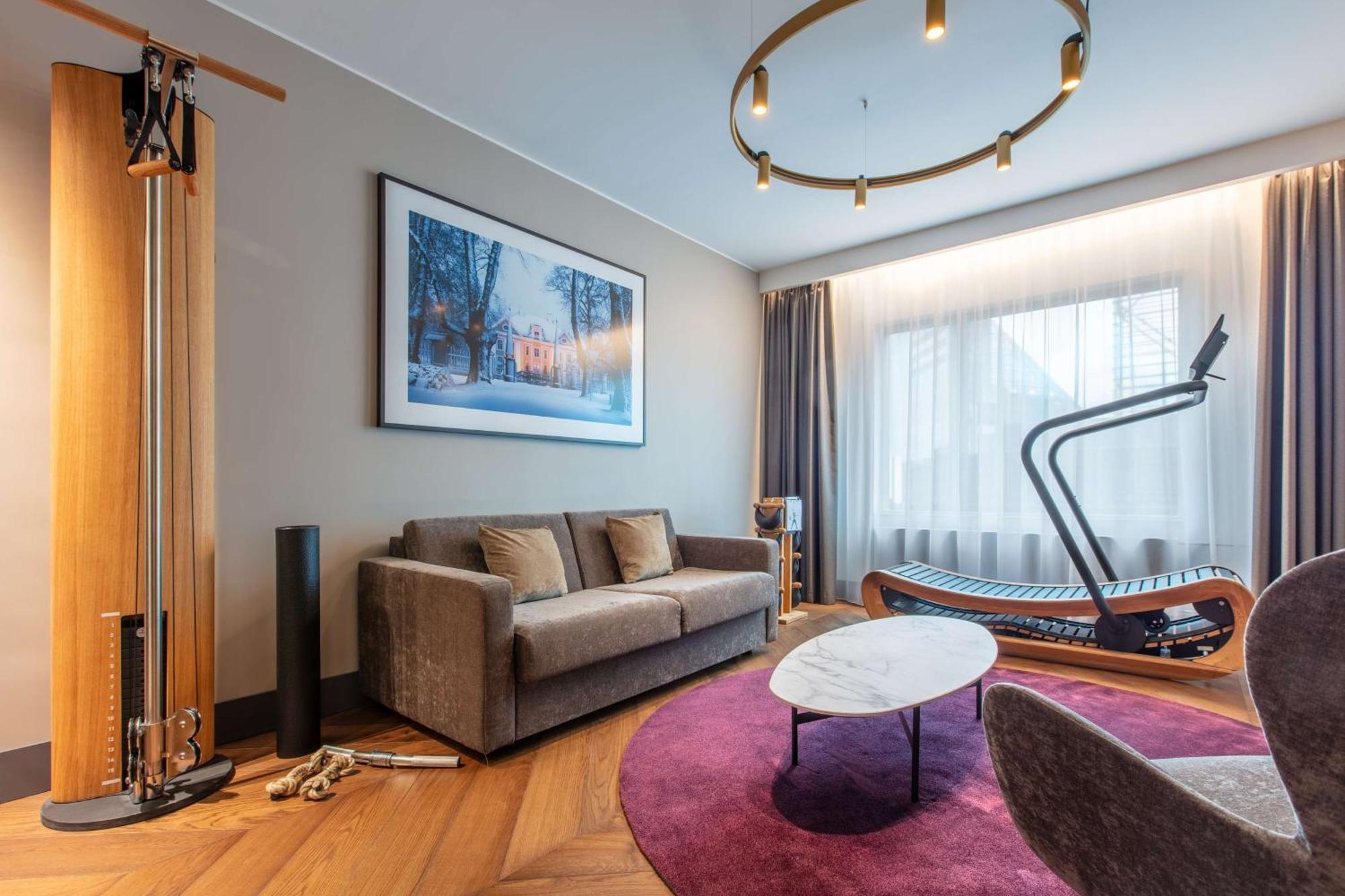 Junior Suite mit eigenem Fitnessbereich und Sauna