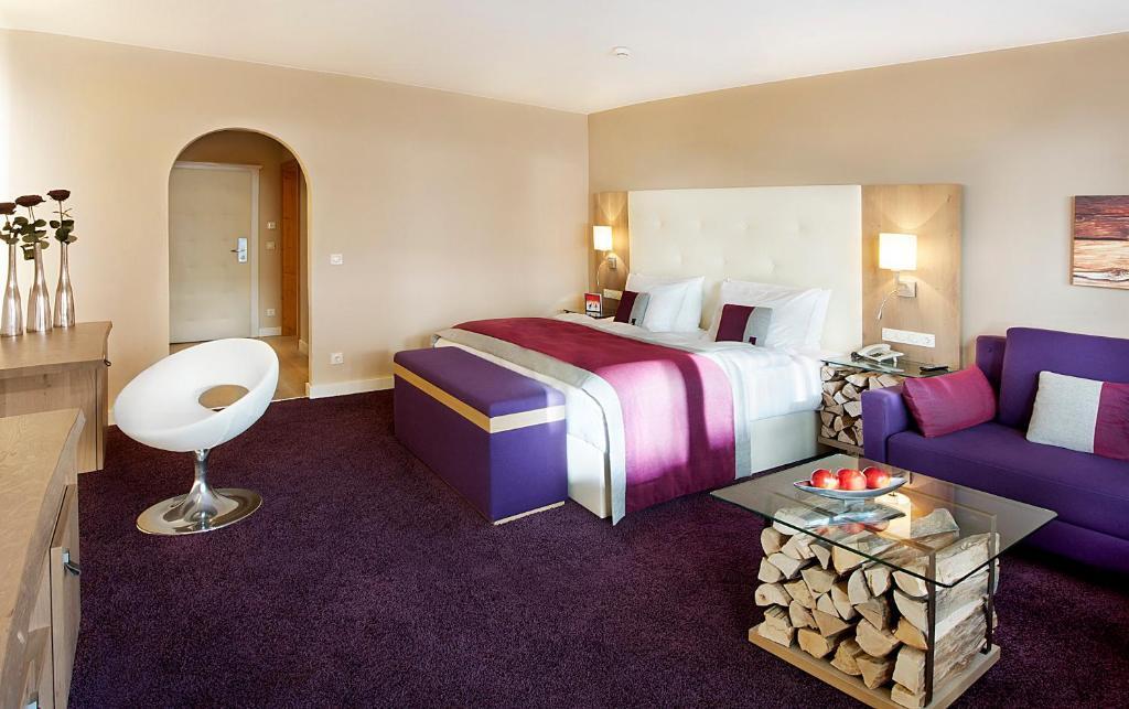 Moderne Junior Suite mit Balkon